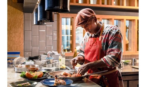 Marcus Samuelsson's Pan Roasted Chicken Farrotto, Confit Mushrooms, Cilantro
